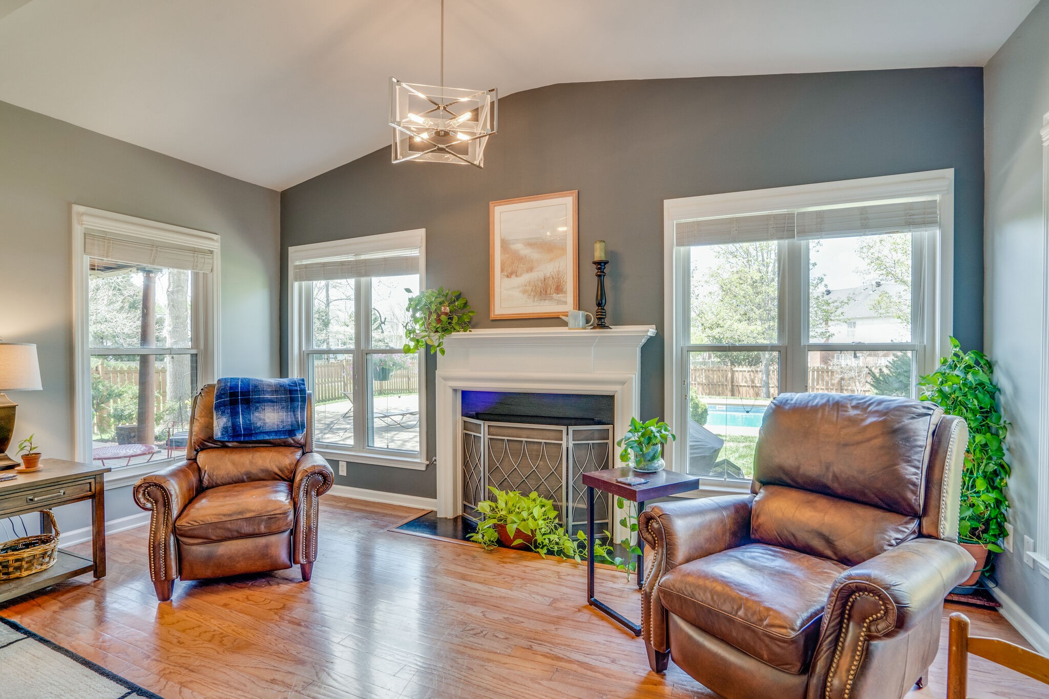 305 Knowle Place Franklin, TN 37069 - Photo 12 of 34 a living room with furniture a fireplace and a large window