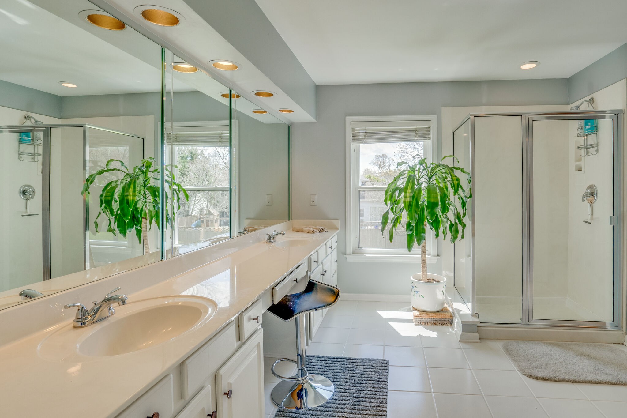 305 Knowle Place Franklin, TN 37069 - Photo 23 of 34 a spacious bathroom with a granite countertop sink and a mirror