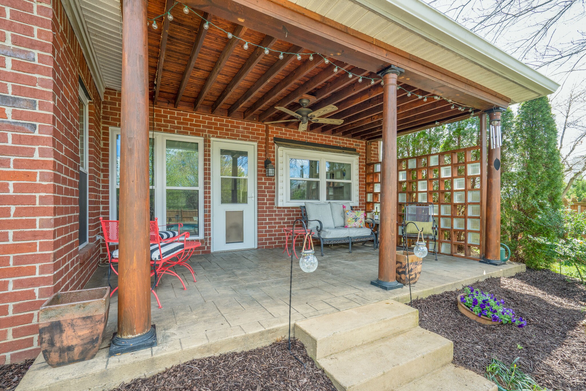 305 Knowle Place Franklin, TN 37069 - Photo 27 of 34 a backyard of a house with seating space