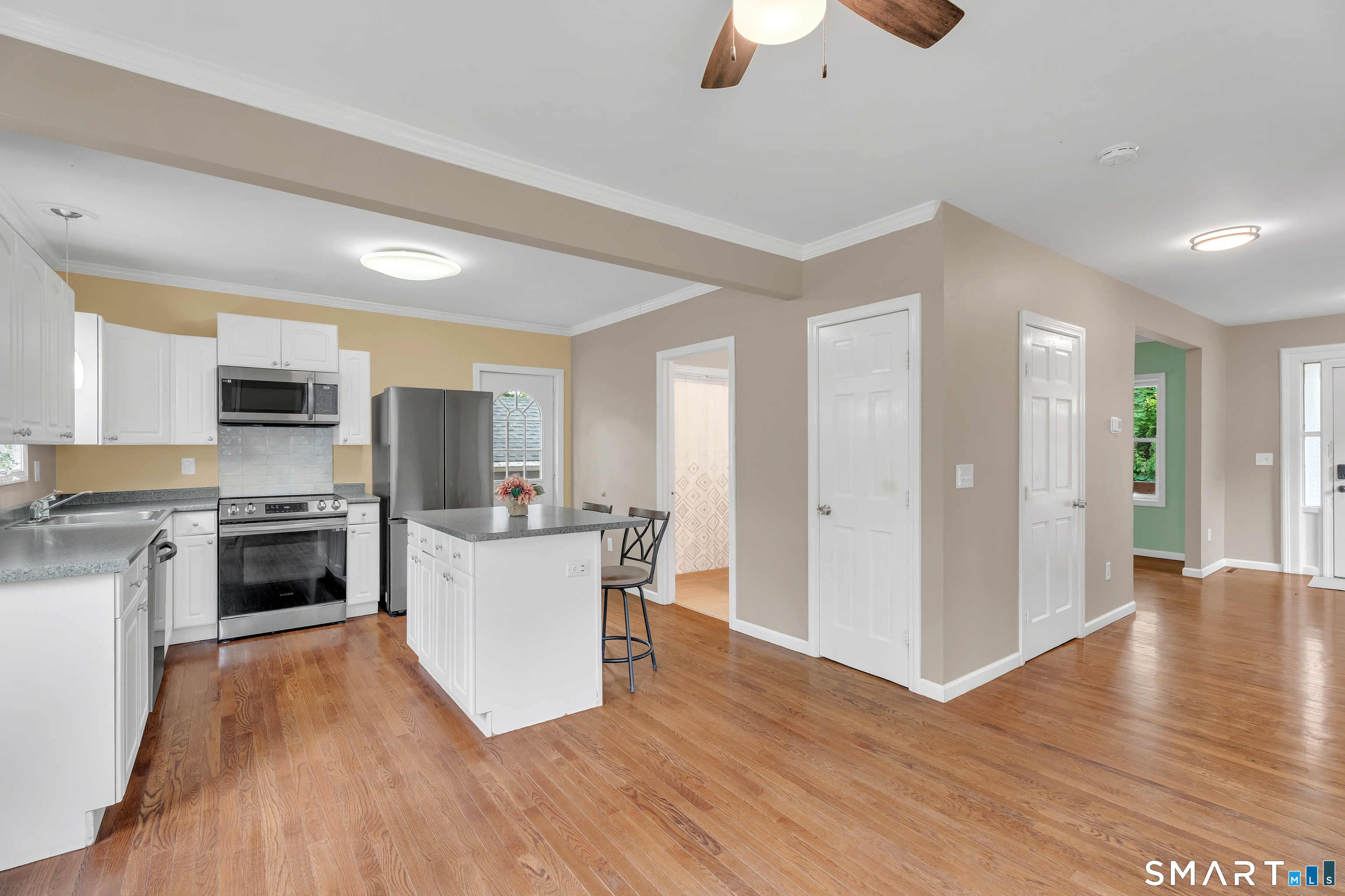 75 Summit Street Norwich, CT 06360 - Photo 16 of 40 a kitchen with a sink and steel appliances