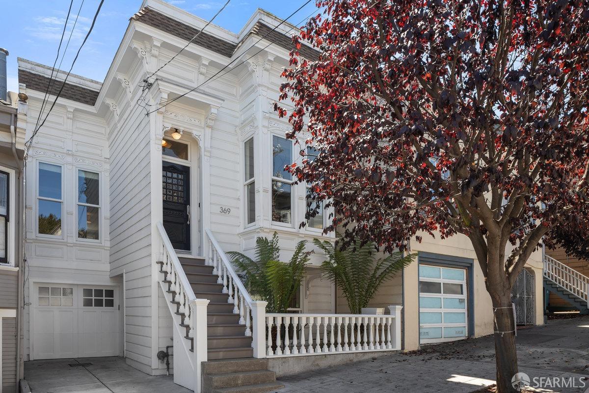 369 Day Street San Francisco, CA 94131 - Photo 1 of 54 a front view of a house with tree s