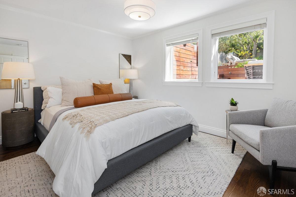 369 Day Street San Francisco, CA 94131 - Photo 15 of 54 a bed room with a bed and a couch