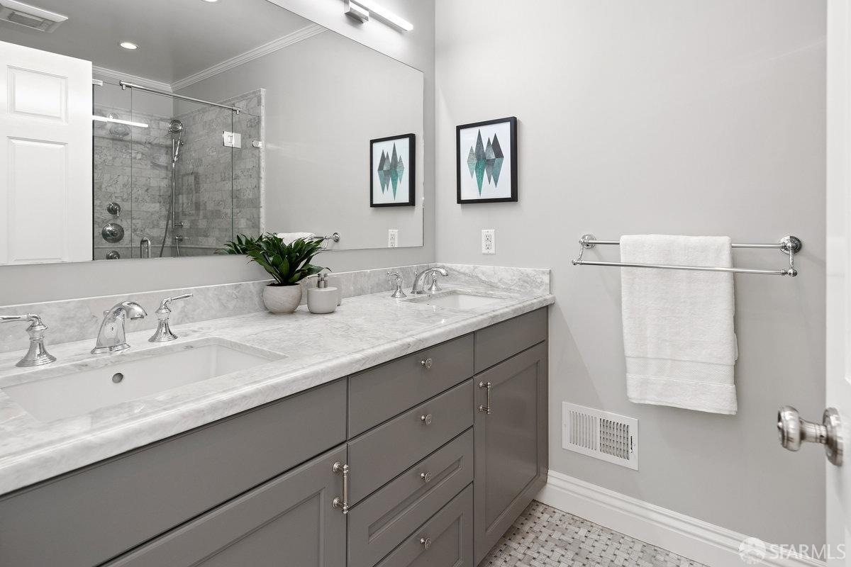 369 Day Street San Francisco, CA 94131 - Photo 16 of 54 a bathroom with a double vanity sink mirror and double