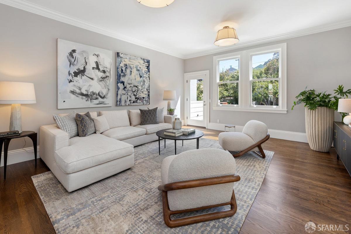 369 Day Street San Francisco, CA 94131 - Photo 2 of 54 a living room with furniture and a potted plant