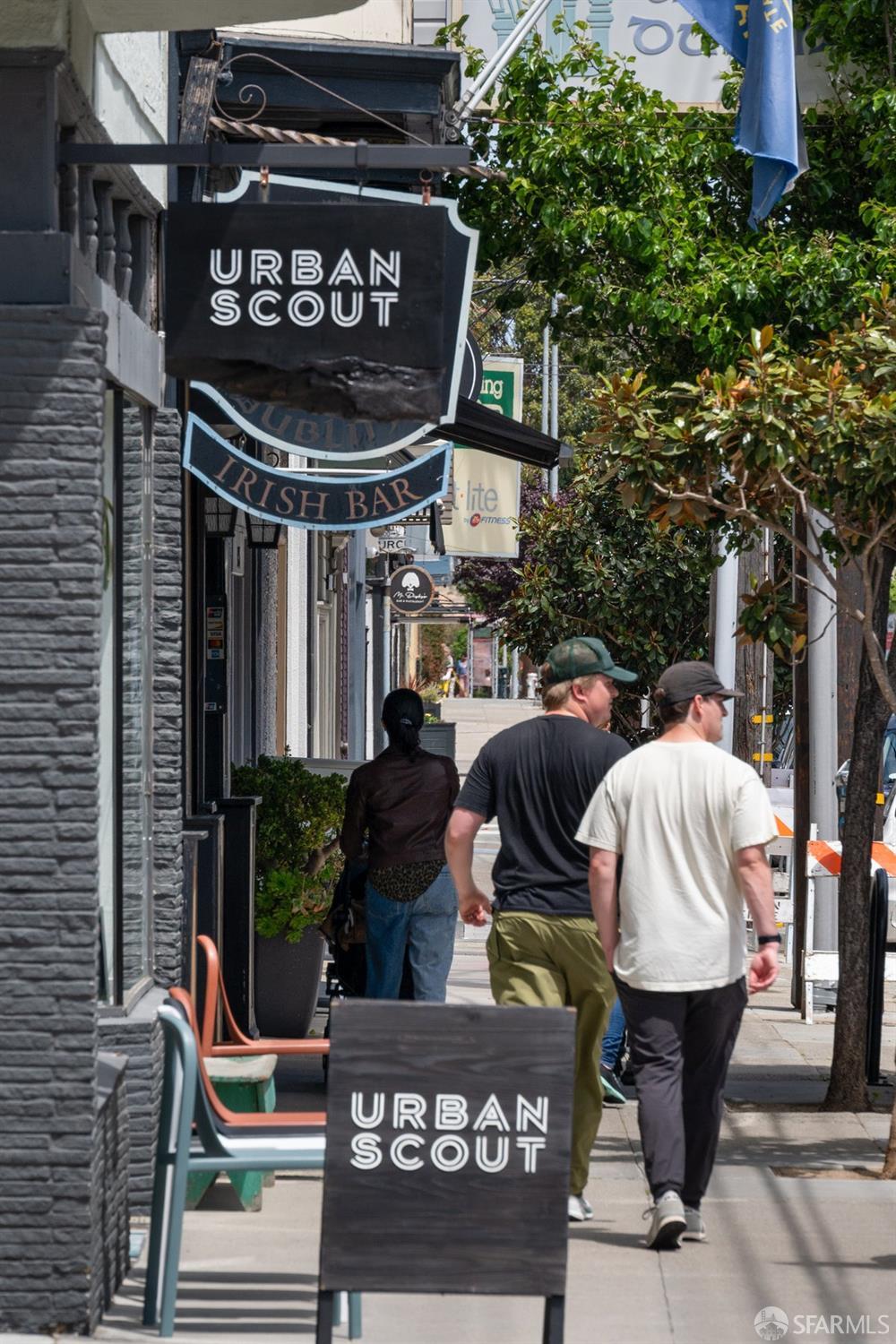 369 Day Street San Francisco, CA 94131 - Photo 38 of 54 a street sign on a pole on a street
