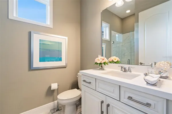 an aerial view of a house with garden space and outdoor seating