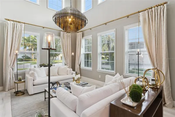 an aerial view of a house with outdoor space and lake view