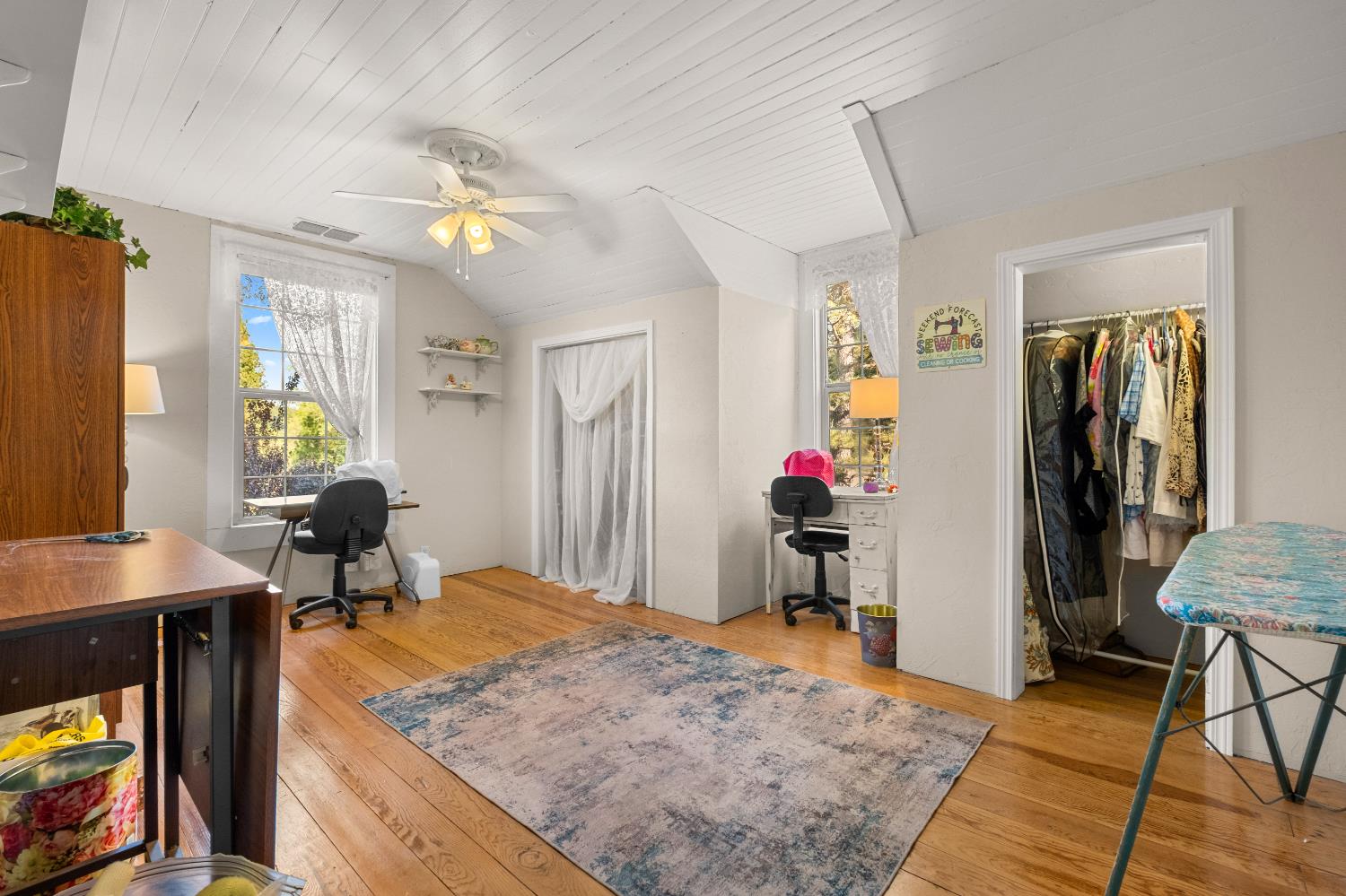 3217 Pleasant Valley Road Placerville, CA 95667 - Photo 24 of 59 a bedroom with a bed and a chandelier
