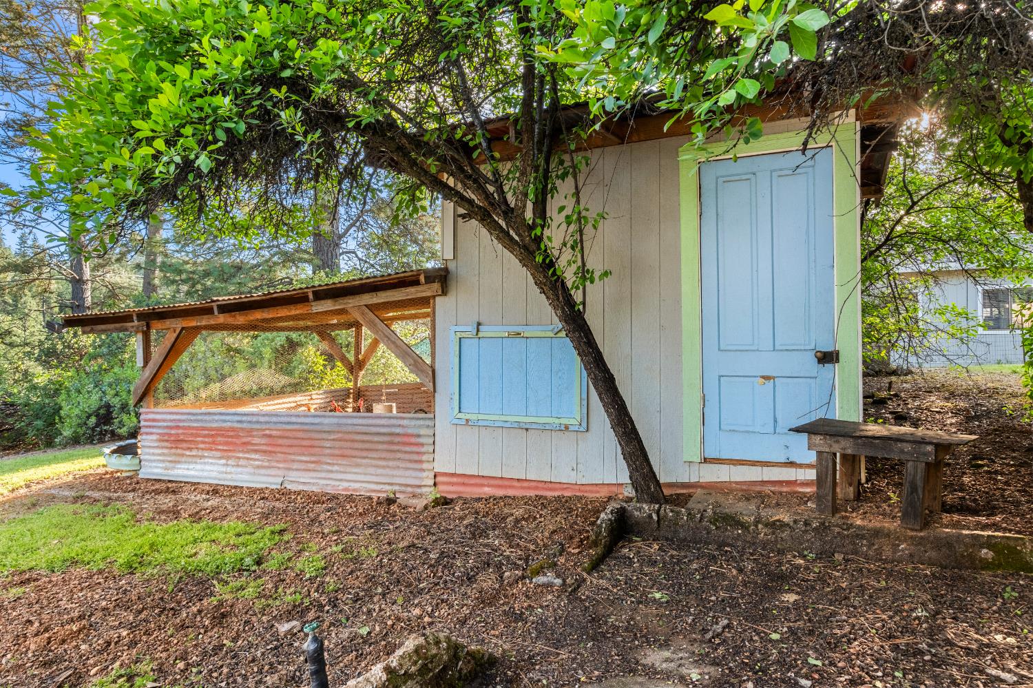 3217 Pleasant Valley Road Placerville, CA 95667 - Photo 54 of 59 a wooden bench sitting in front of a house