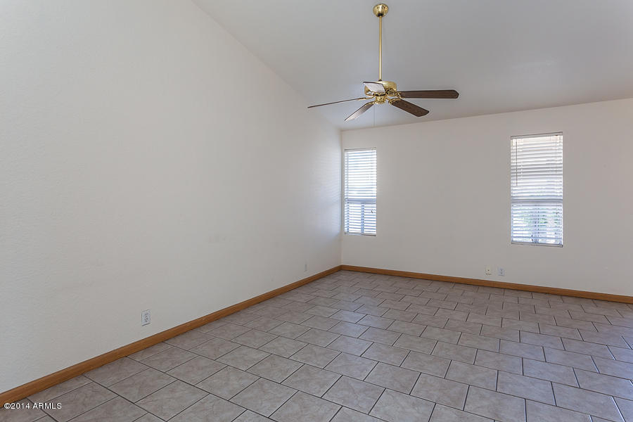 8755 West Ocotillo Road Glendale, AZ 85305 - Photo 5 of 12 Family Room with Vaulted Ceiling