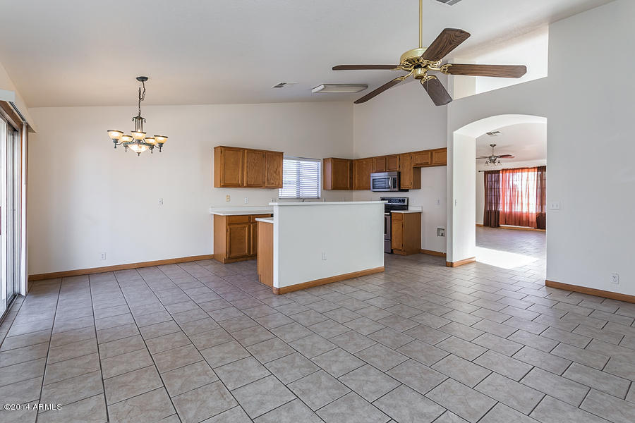 8755 West Ocotillo Road Glendale, AZ 85305 - Photo 6 of 12 Family Room opens to Kitchen