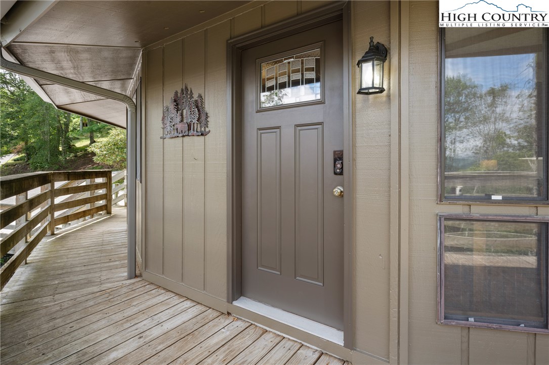 315 Timber Ridge Road, Unit A3 Sugar Mountain, NC 28604 - Photo 14 of 27 a view of a hallway with wooden floor
