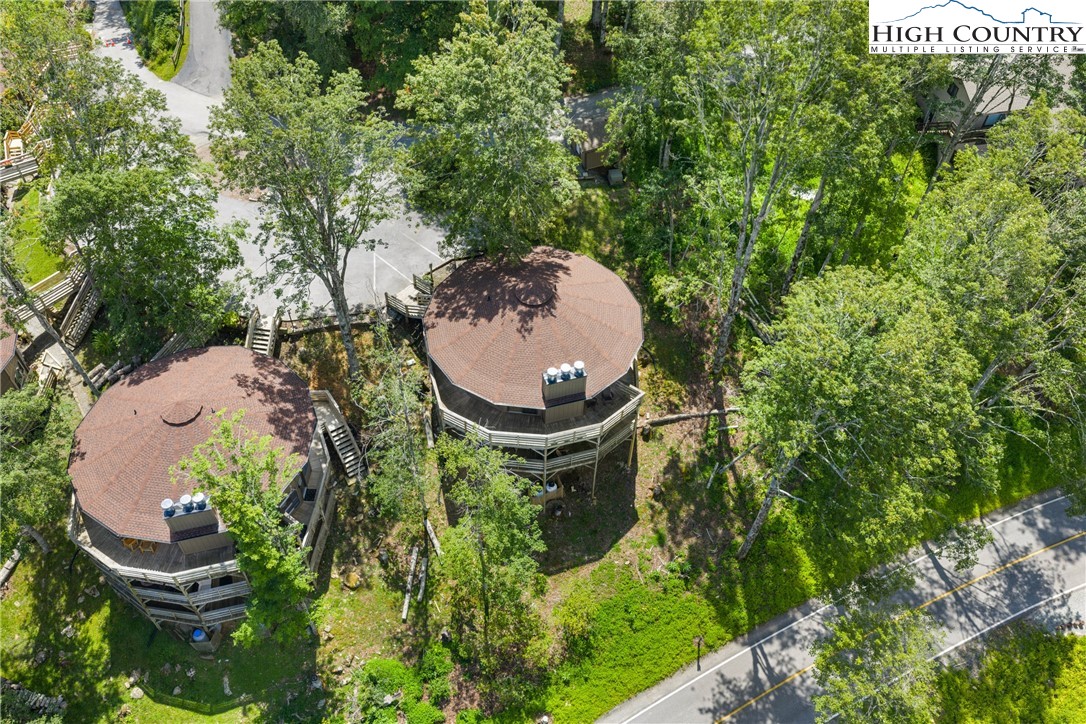 315 Timber Ridge Road, Unit A3 Sugar Mountain, NC 28604 - Photo 19 of 27 an aerial view of a house with garden space and a lake view