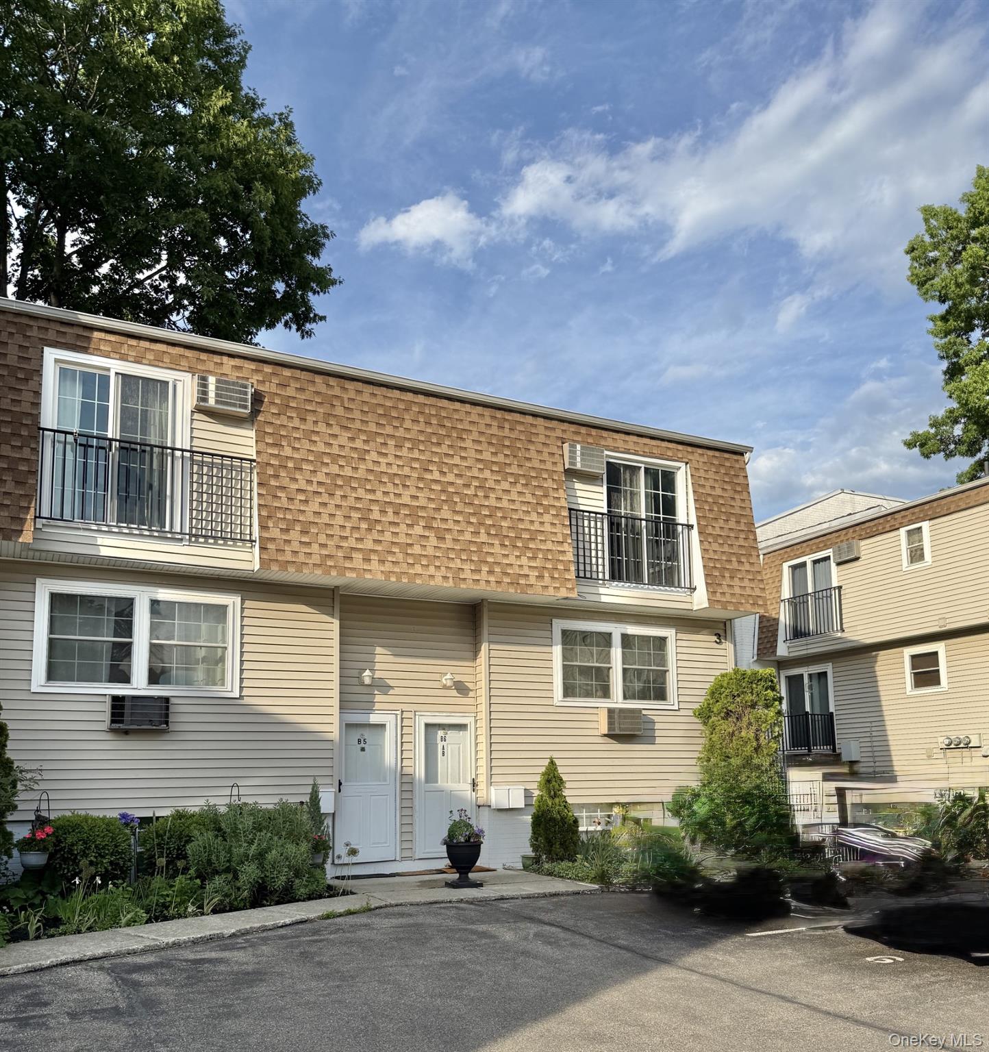 Front door entry with parking area