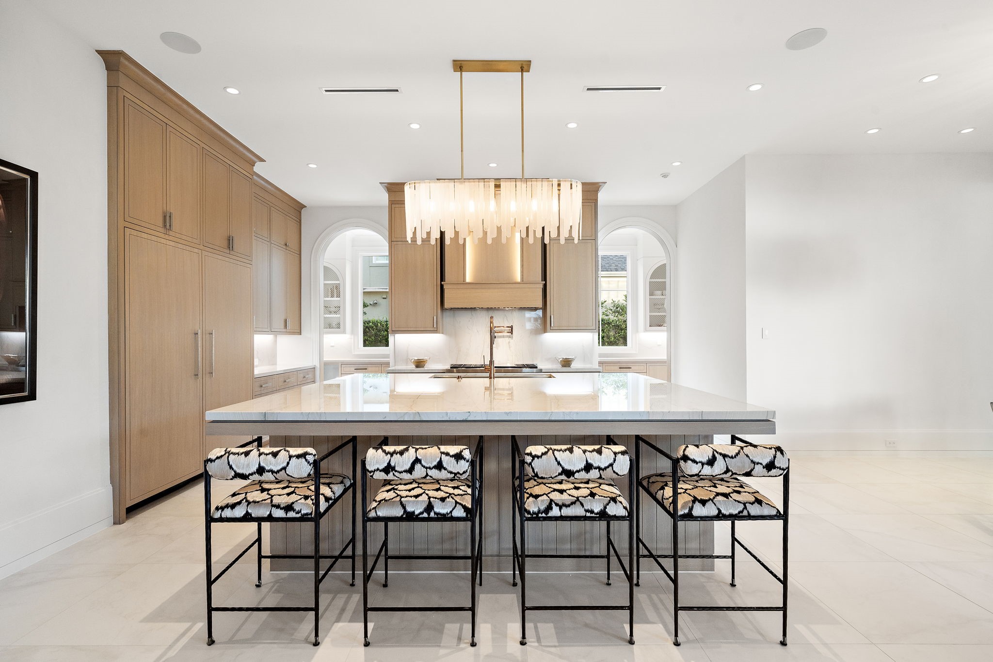 3649 Chevy Chase Drive Houston, TX 77019 - Photo 13 of 50 At the heart of the home, Mont Blanc quartzite counters and integrated appliances reflect refined design integrity and effortless everyday luxury.