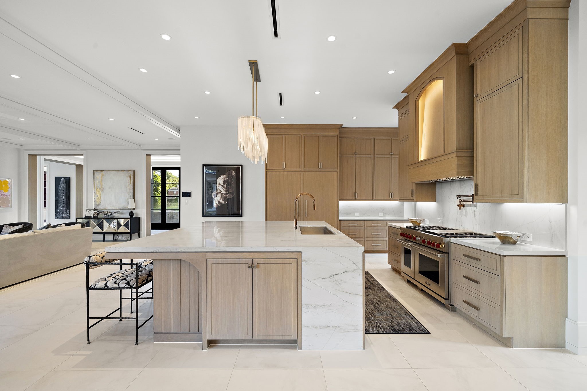 3649 Chevy Chase Drive Houston, TX 77019 - Photo 16 of 50 A chef-caliber kitchen with Wolf 6-burner gas range, griddle, custom vent hood, pot filler, Sub-Zero refrigeration, and dual dishwashers, where form meets professional-grade function.