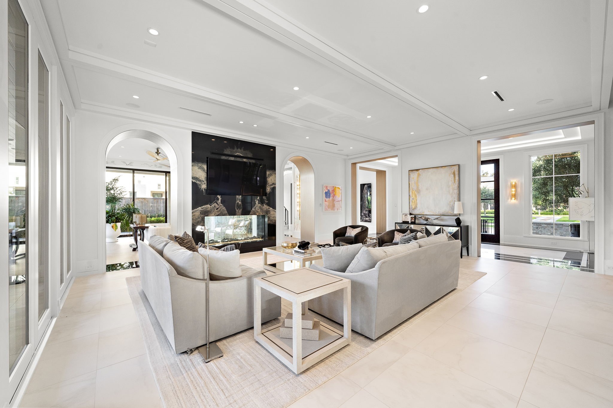 3649 Chevy Chase Drive Houston, TX 77019 - Photo 20 of 50 Beautifully designed first floor with 11' ceilings, two staircases, dual powder baths, elevator, mudroom, and abundant storage.