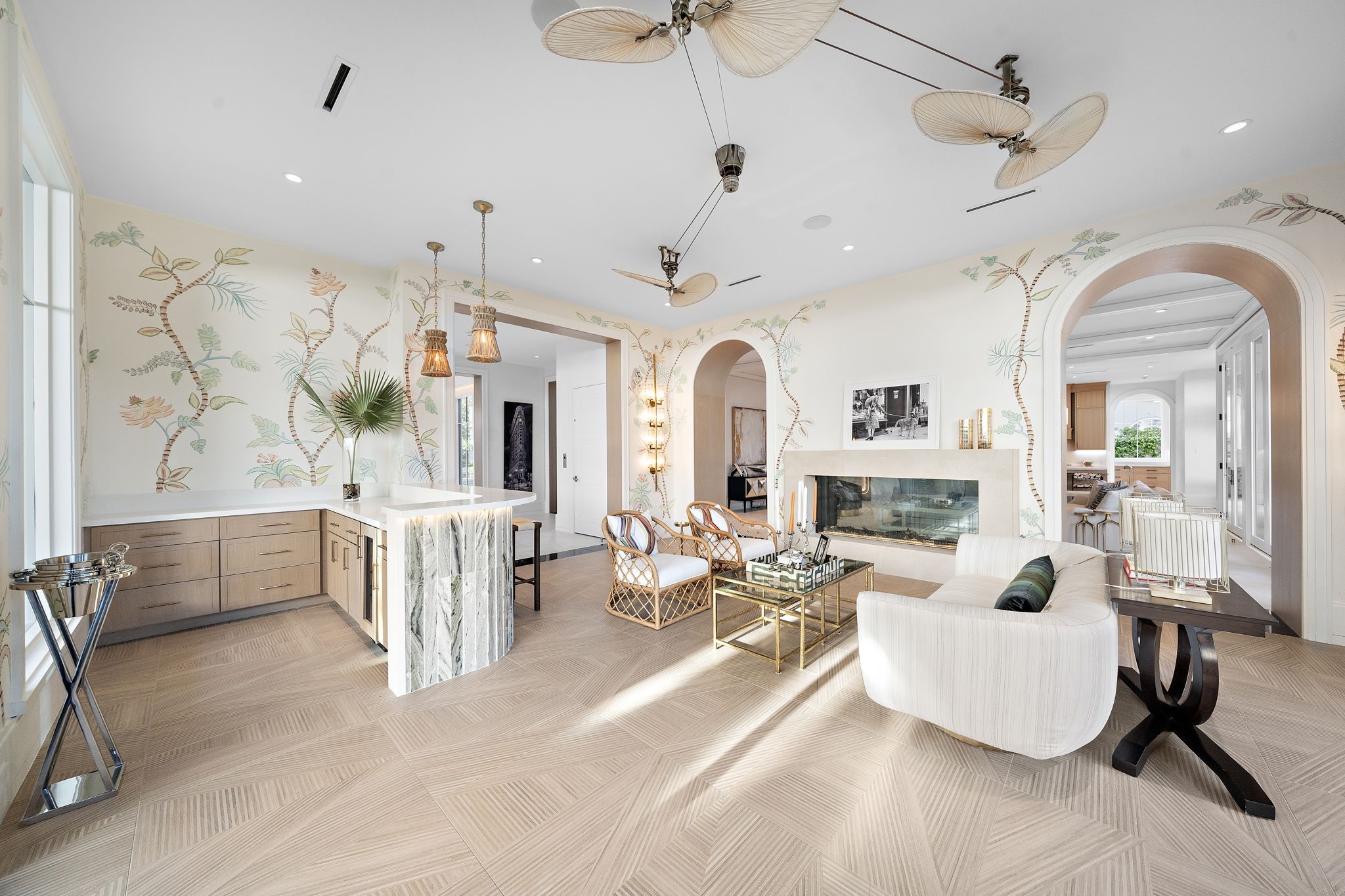 3649 Chevy Chase Drive Houston, TX 77019 - Photo 23 of 50 Designed for both quiet relaxation and lively gatherings, the sunroom features designer Visual Comfort fixtures and porcelain bamboo tiles.