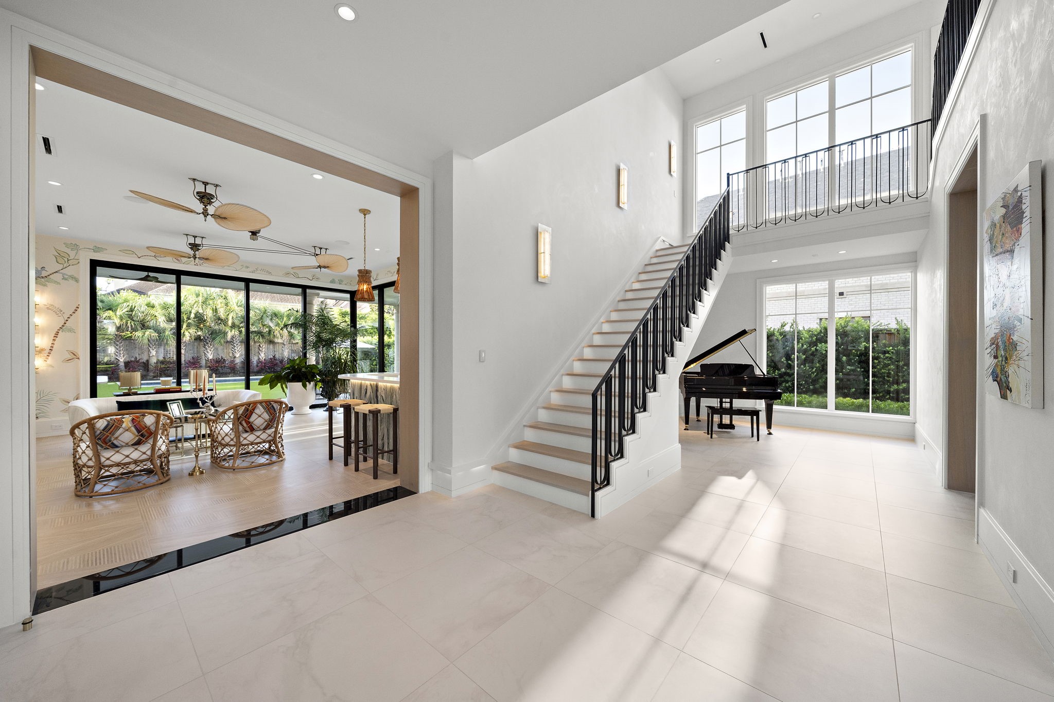 3649 Chevy Chase Drive Houston, TX 77019 - Photo 26 of 50 Tucked off the grand hallway, the main staircase is thoughtfully positioned to allow elevator access and space for a distinguished focal point, be it a piano, gallery wall, or collector’s piece.