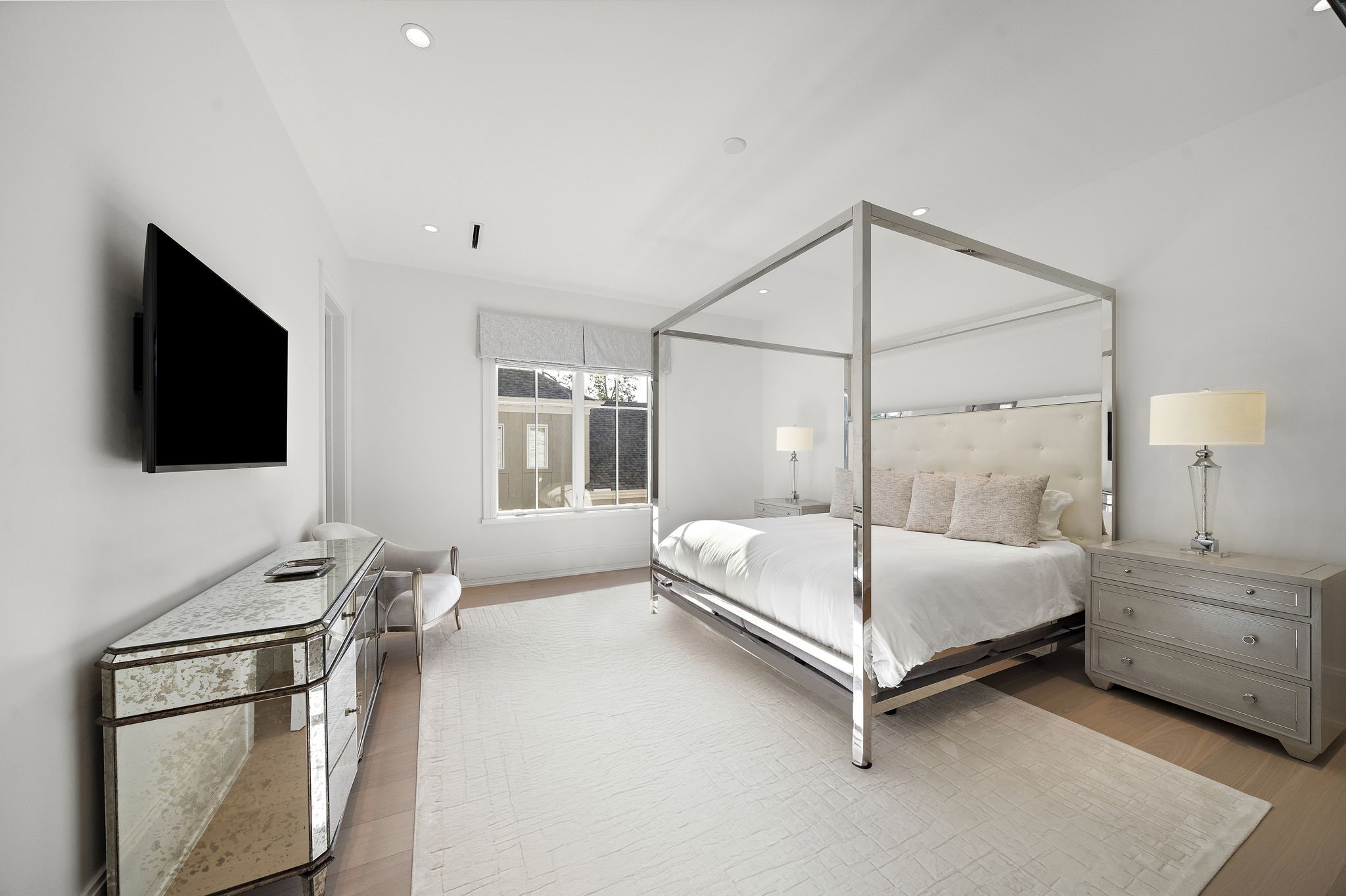 3649 Chevy Chase Drive Houston, TX 77019 - Photo 34 of 50 One of four ensuite secondary bedrooms, this 17' x 14' space has high ceilings, European oak flooring, walk-in closet, and beautifully appointed bath with walk-in shower.