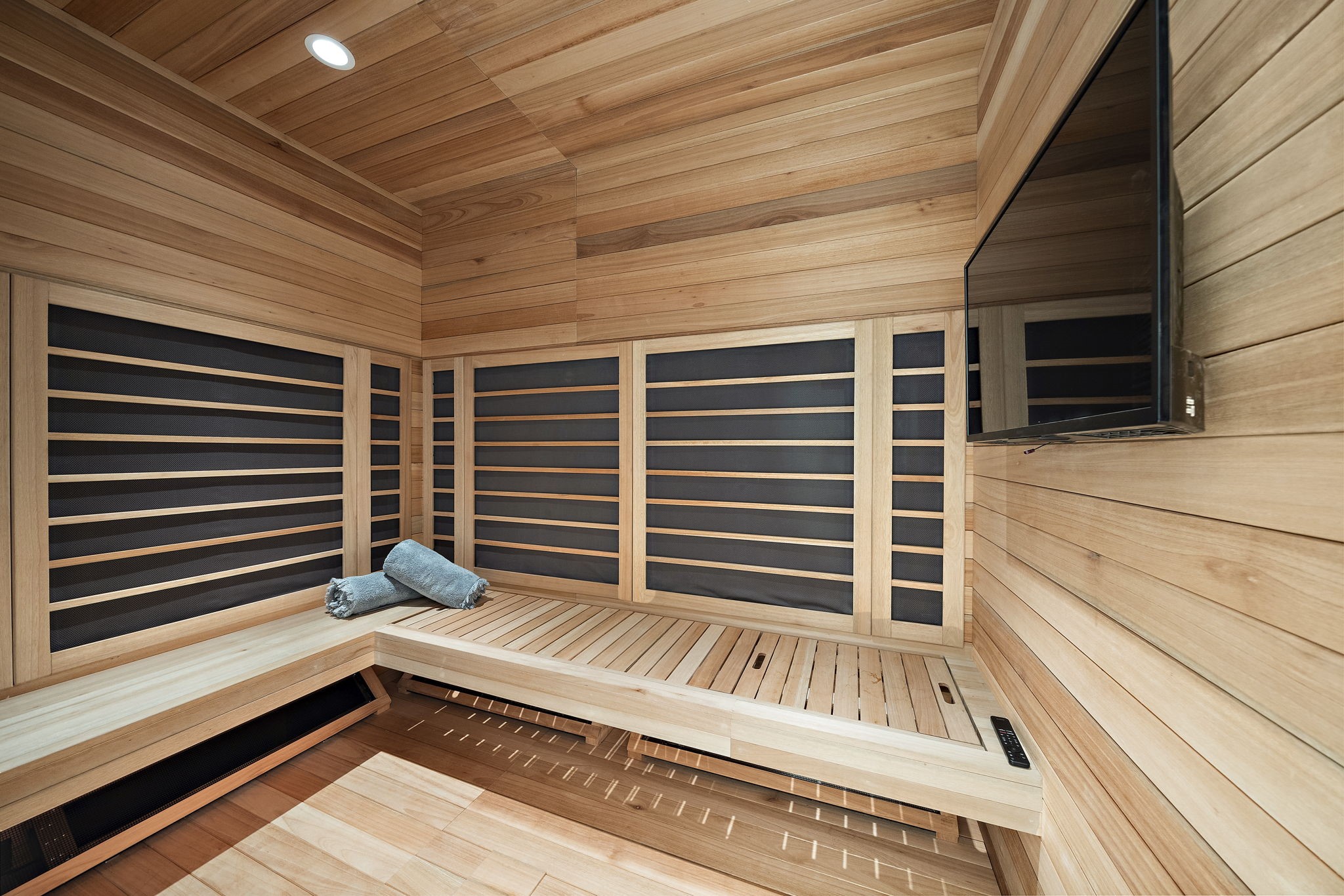 3649 Chevy Chase Drive Houston, TX 77019 - Photo 42 of 50 Your wellness retreat with sauna and TV, steam shower with bench, double sinks with pure white quartz counters, and a Toto washlet toilet for a spa-like experience at home.