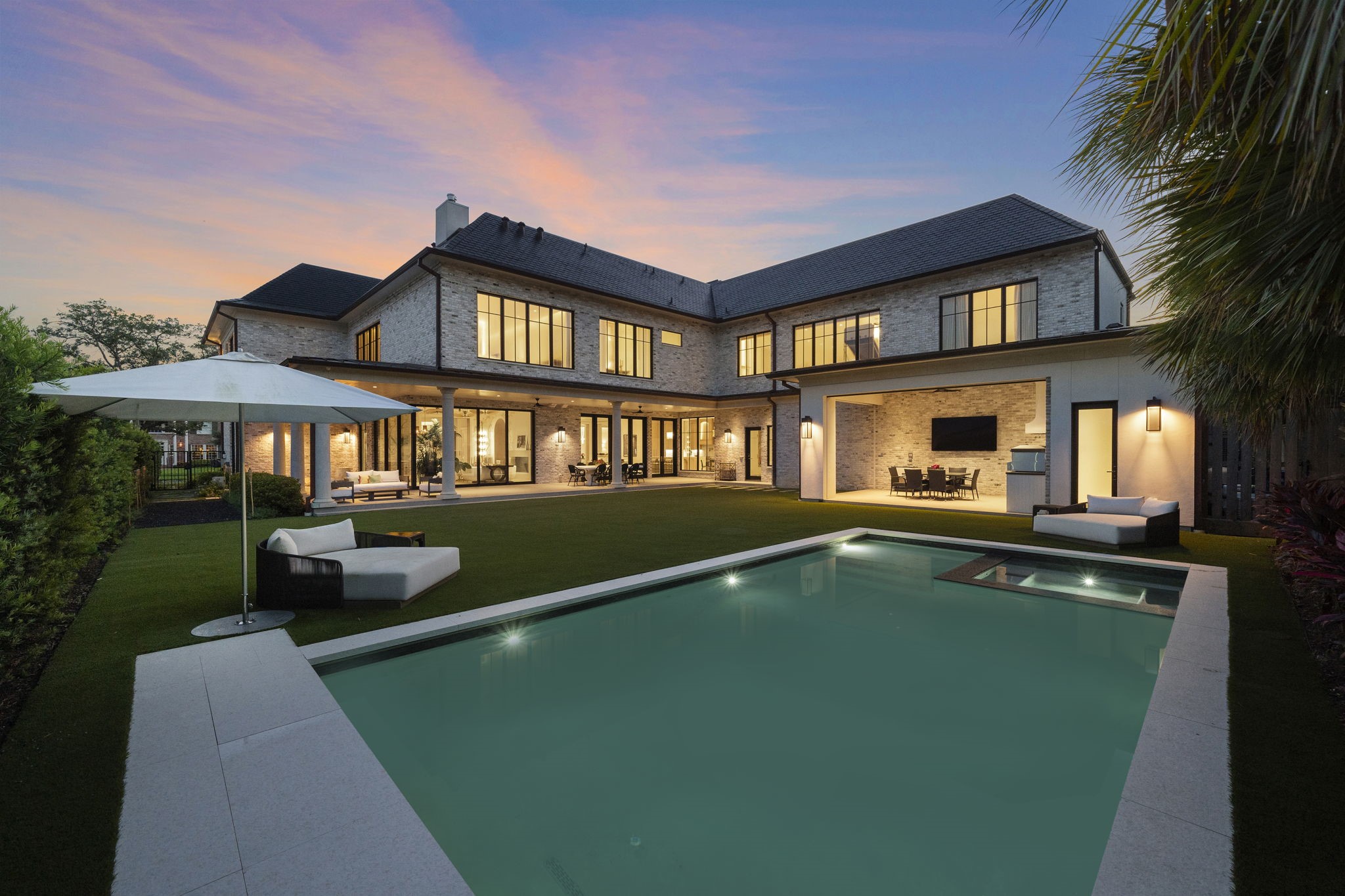 3649 Chevy Chase Drive Houston, TX 77019 - Photo 49 of 50 Heated pool and spa (32'x17') with electric cover, positioned at the back of the yard to maximize green space.