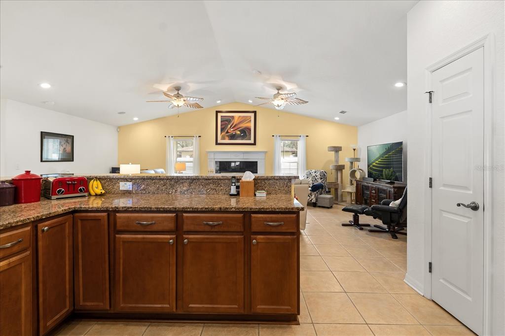 1254 Timberidge Loop South Lakeland, FL 33809 - Photo 17 of 36 a kitchen with a sink and cabinets