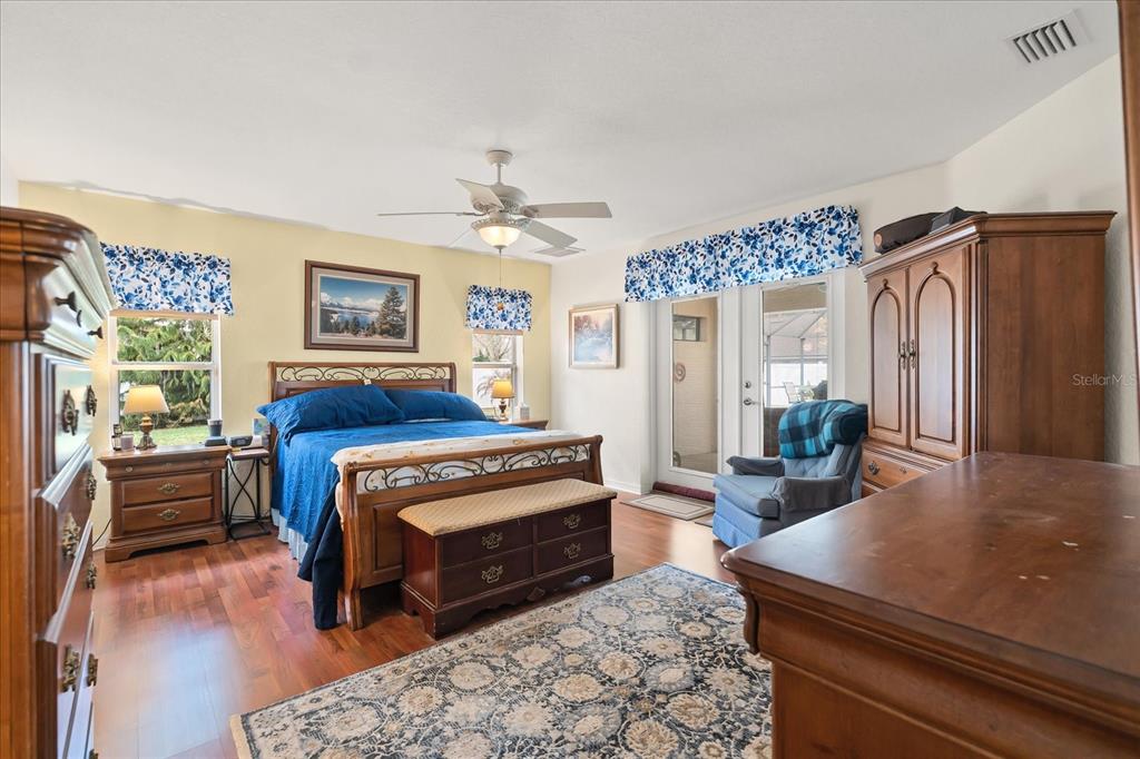 1254 Timberidge Loop South Lakeland, FL 33809 - Photo 18 of 36 a living room with furniture and a wooden floor