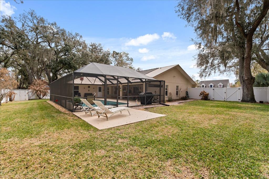 1254 Timberidge Loop South Lakeland, FL 33809 - Photo 33 of 36 a front view of house with garden and patio