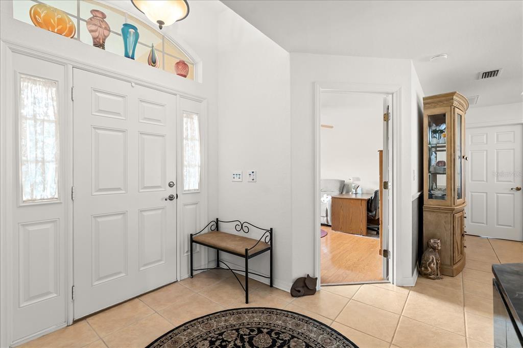 1254 Timberidge Loop South Lakeland, FL 33809 - Photo 7 of 36 a living room with furniture and a rug