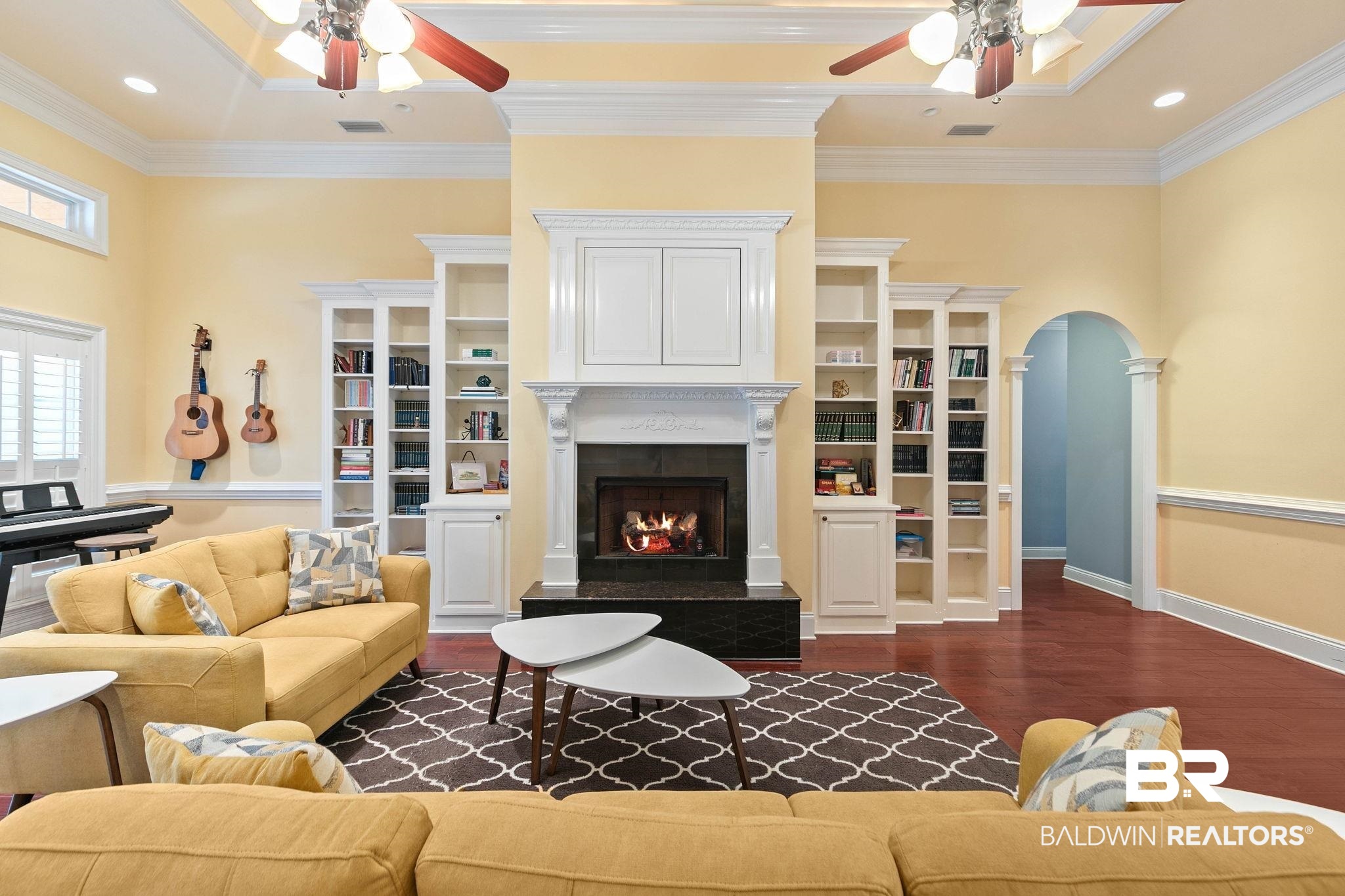 3668 Claridge Road North Mobile, AL 36608 - Photo 25 of 100 Living room featuring a ceiling fan, arched walkways, dark wood finished floors, recessed lighting, and ornamental molding