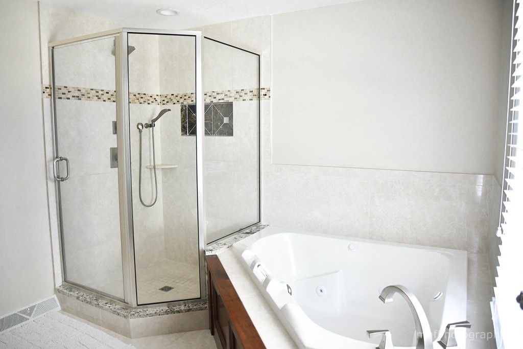 82 Cranberry Circle Sudbury, MA 01776 - Photo 25 of 30 a bathroom with a tub and shower