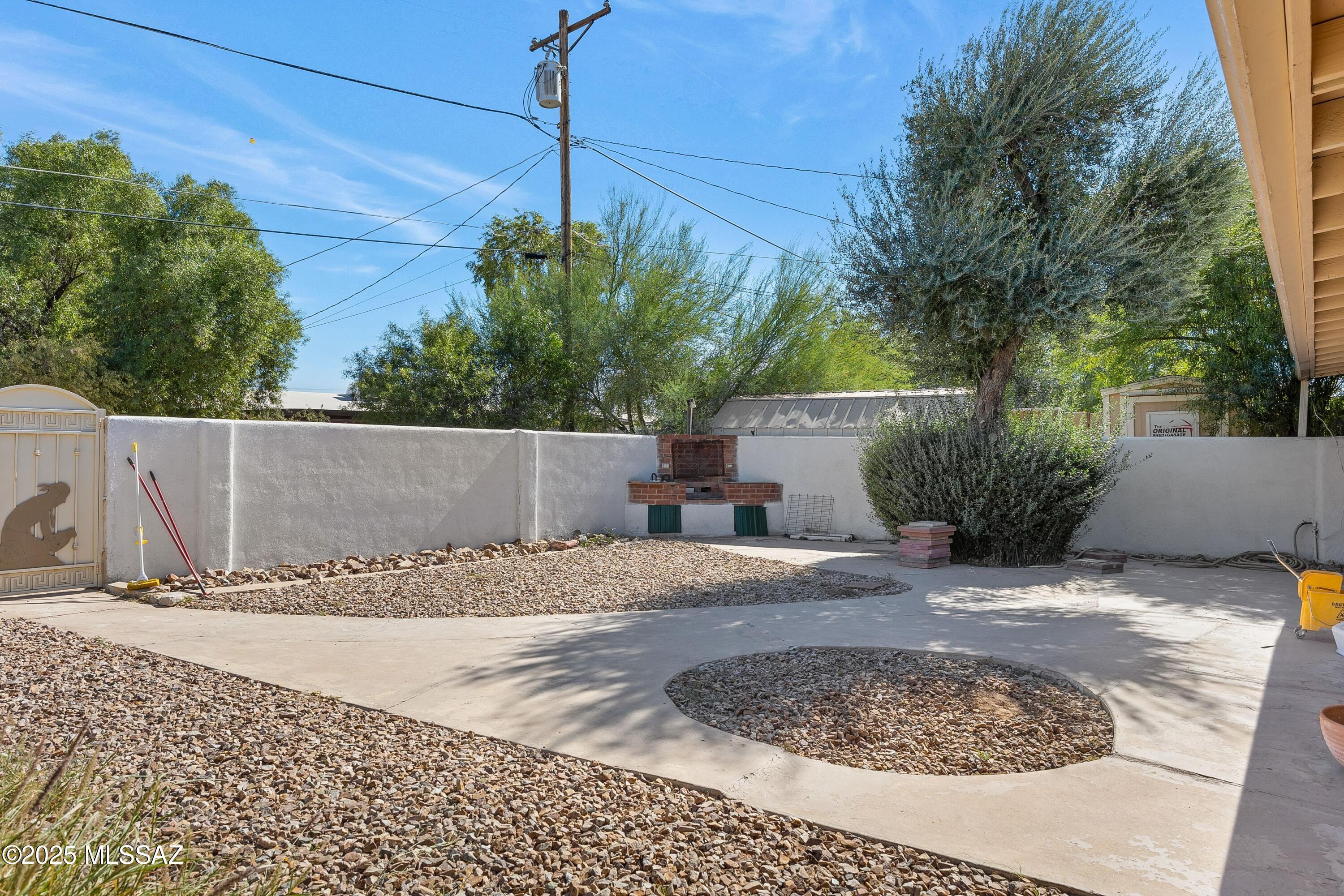 3326 North Reno Avenue Tucson, AZ 85705 - Photo 18 of 21 Walled-in Backyard with built-in BBQ