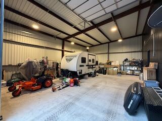 475 Happy Trail Dripping Springs, TX 78620 - Photo 30 of 40 This is the garage attached to the party barn. Can store RV and or cars.
