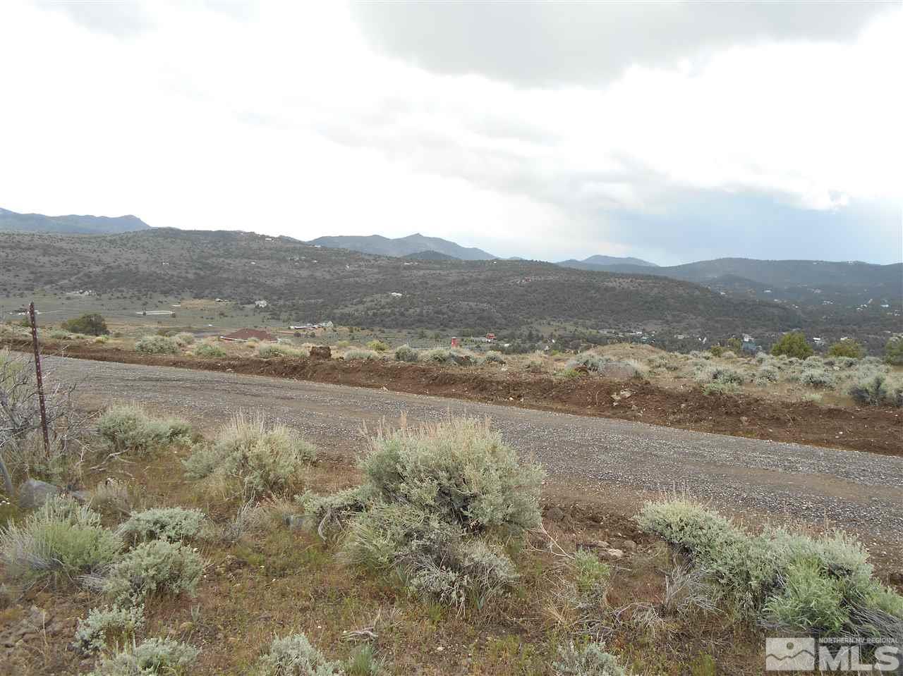 2440 Flatiron Road Reno, NV 89521 - Photo 2 of 24 a view of lake with mountain
