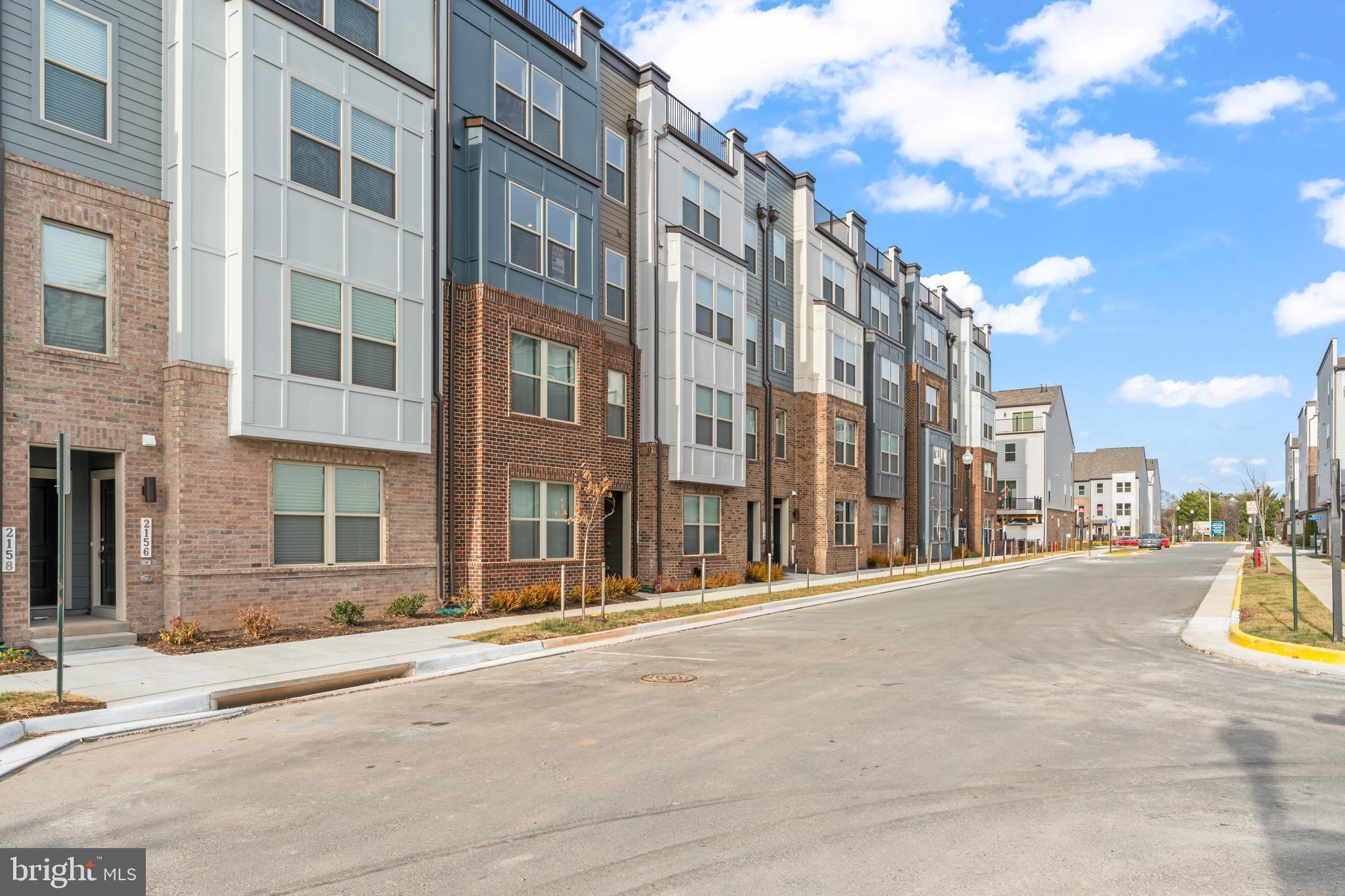 2152 Glacier Road, Unit 66 Herndon, VA 20170 - Photo 3 of 50 a view of a building with a street