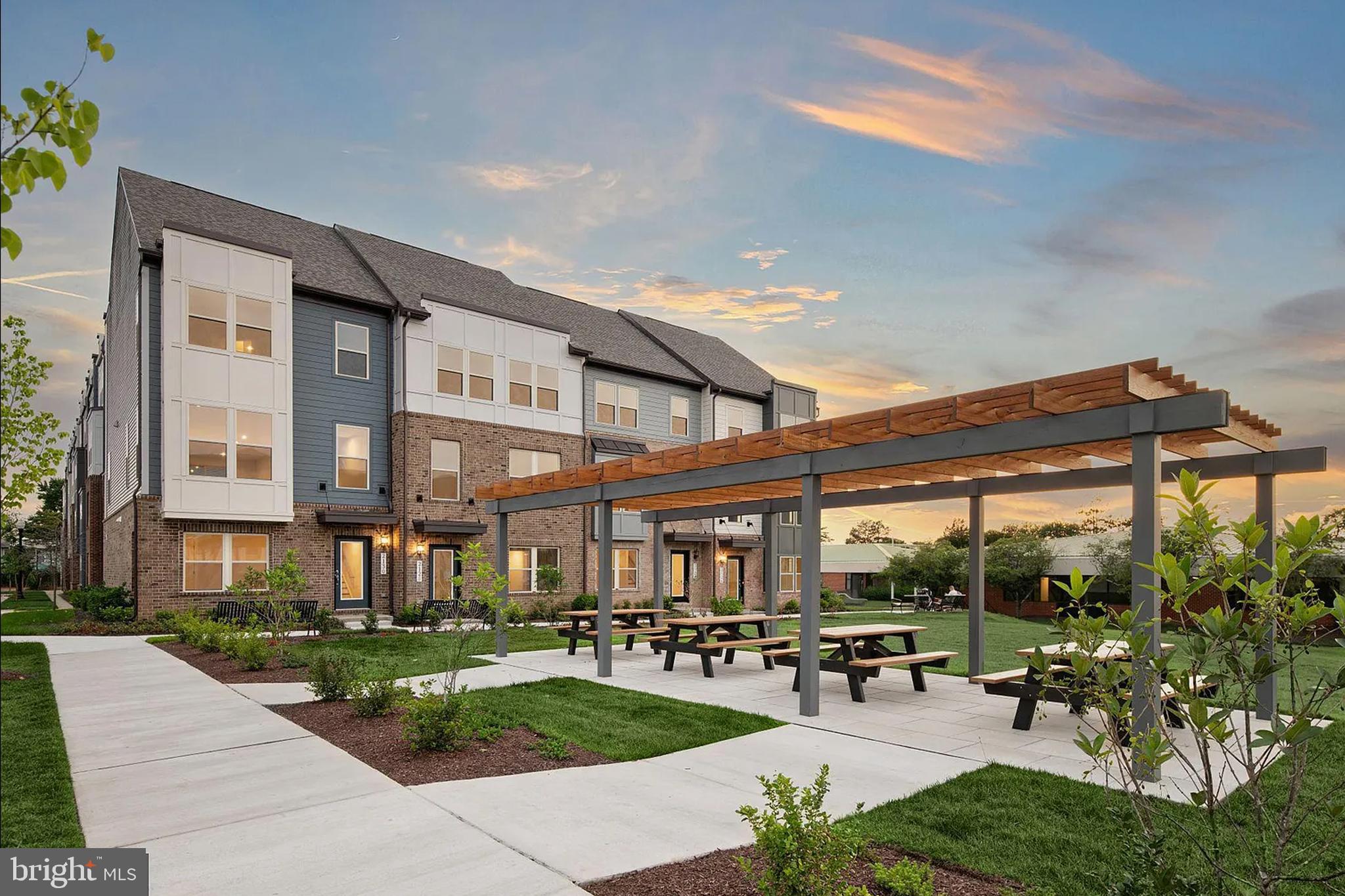 2152 Glacier Road, Unit 66 Herndon, VA 20170 - Photo 4 of 50 a view of a building with a garden and sitting area