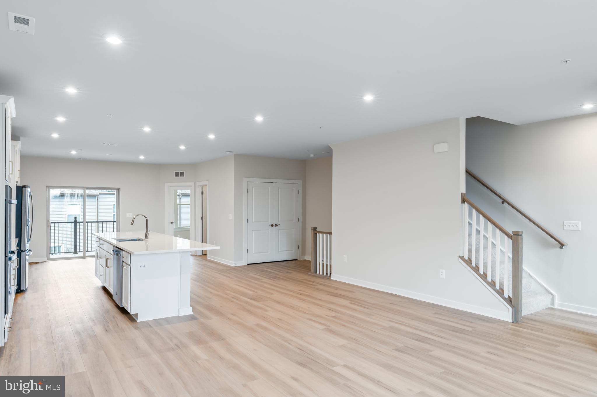 2152 Glacier Road, Unit 66 Herndon, VA 20170 - Photo 7 of 50 a living room with a couch and wooden floor