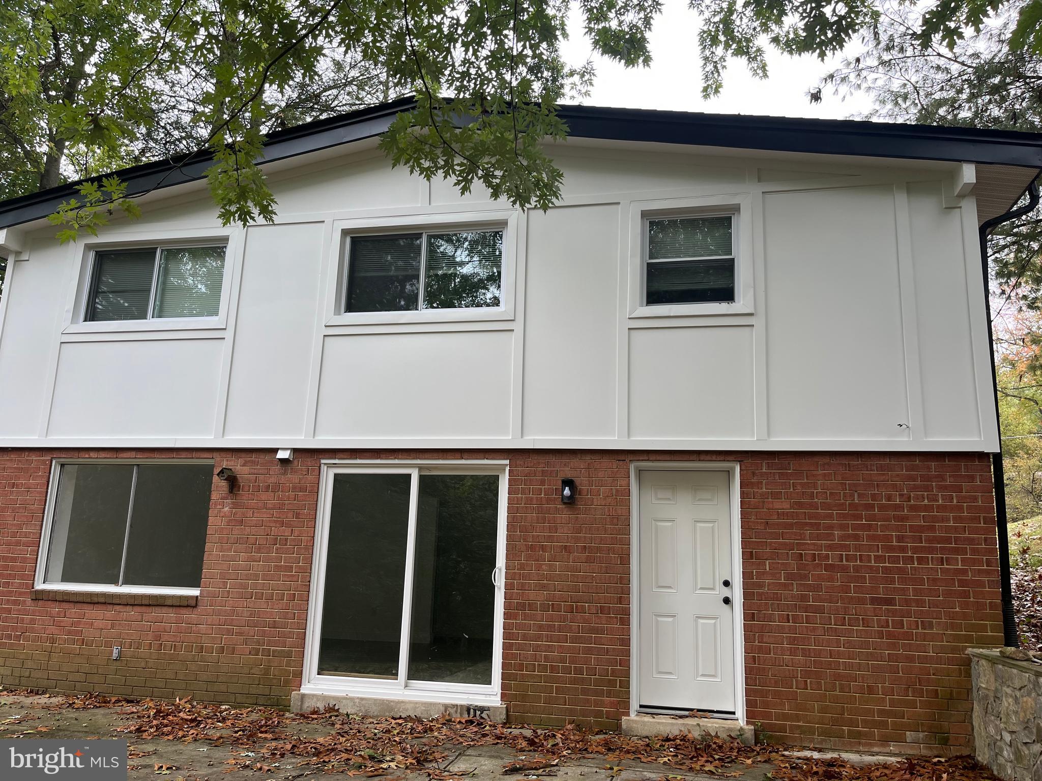 611 Winona Court Silver Spring, MD 20902 - Photo 15 of 15 a front view of a house with windows