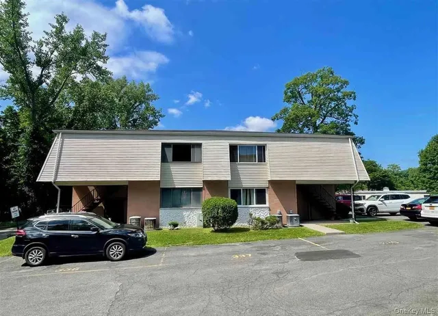 a car parked in front of a house