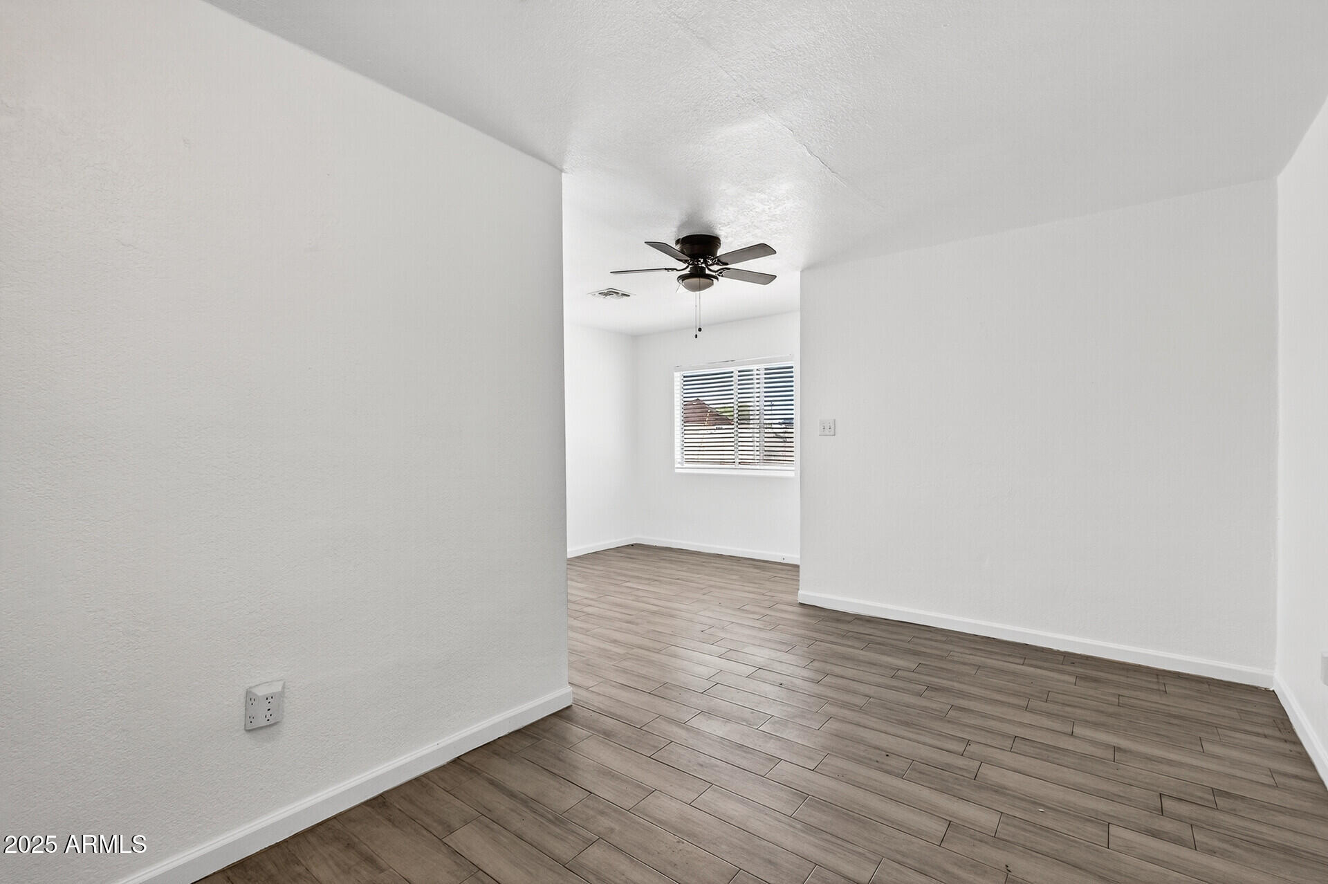 107 West 11th Street Casa Grande, AZ 85122 - Photo 14 of 45 a view of a room with wooden floor