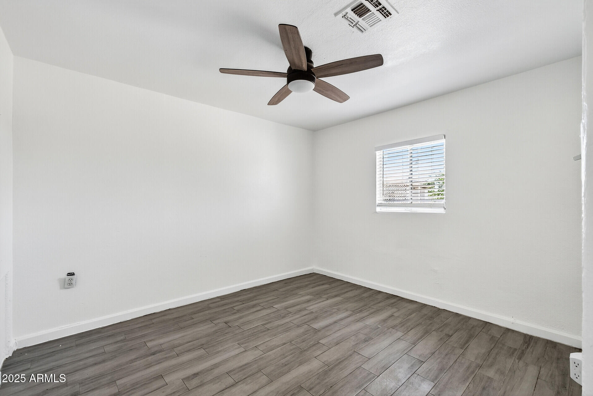 107 West 11th Street Casa Grande, AZ 85122 - Photo 18 of 45 wooden floor in an empty room