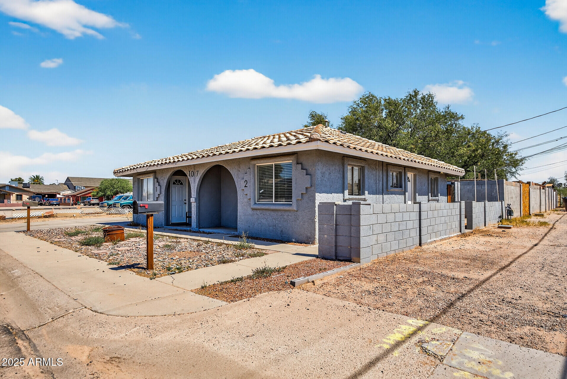 107 West 11th Street Casa Grande, AZ 85122 - Photo 2 of 45 a view of a house with wooden fence