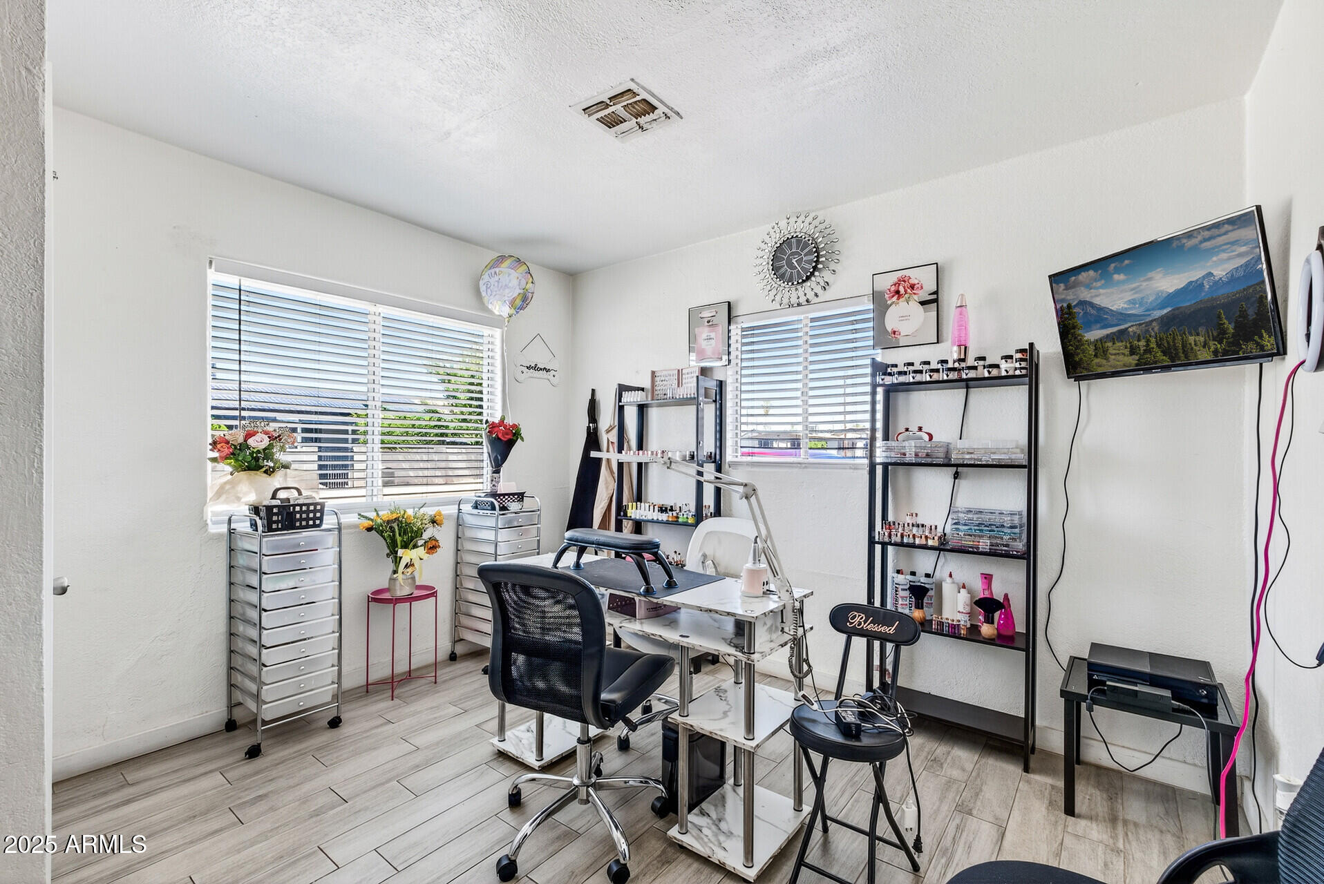 107 West 11th Street Casa Grande, AZ 85122 - Photo 24 of 45 a view of a workspace with furniture and a window