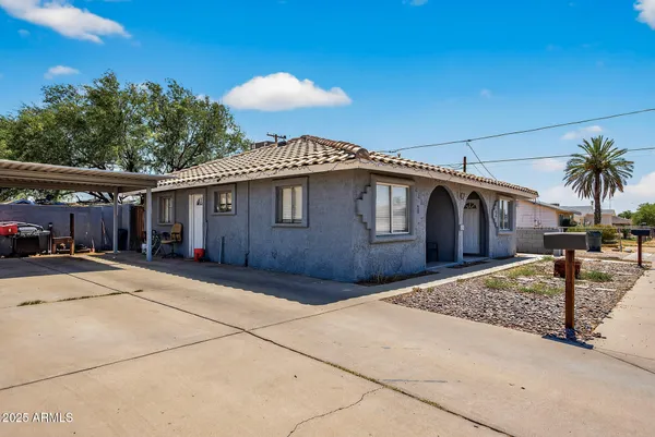 a view of a house with a patio