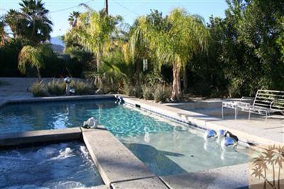 68470 Terrace Road Cathedral City, CA 92234 - Photo 1 of 17 a view of a swimming pool with a patio