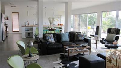 68470 Terrace Road Cathedral City, CA 92234 - Photo 3 of 17 a living room with furniture and a large window