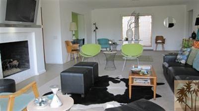 68470 Terrace Road Cathedral City, CA 92234 - Photo 5 of 17 a living room with furniture and a fireplace