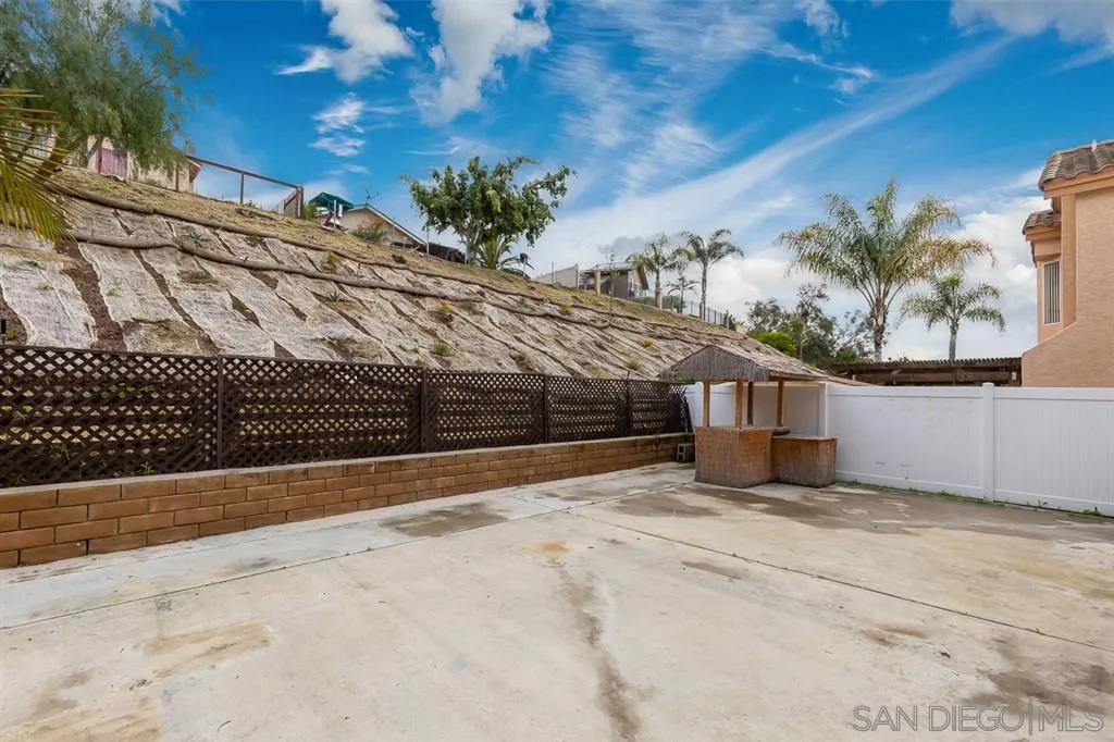 555 Kiley Road Chula Vista, CA 91910 - Photo 22 of 24 a view of a backyard of a house