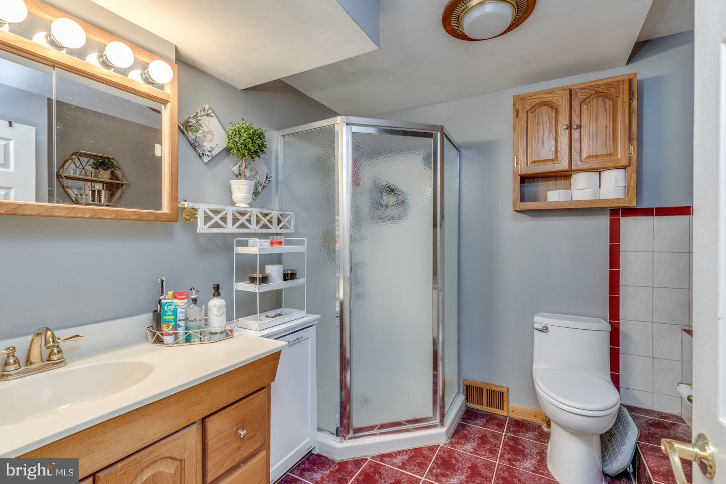 227 South Fellowship Road Maple Shade, NJ 08052 - Photo 28 of 41 a bathroom with a sink a toilet and a shower